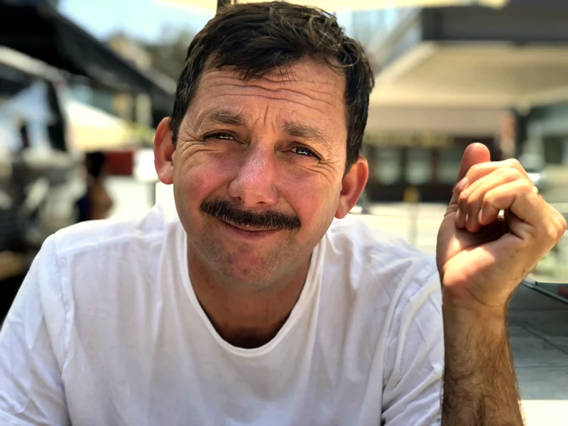 Alex Hoerner, fine art and editorial photographer, in a casual portrait outdoors