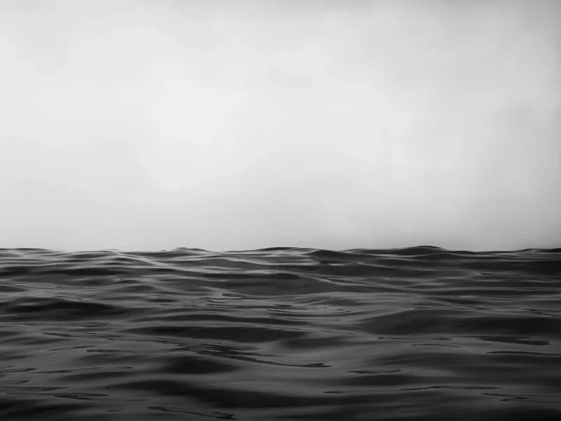 Inceville III — black-and-white water-level photograph of choppy ocean waves against a bright overcast sky, Santa Monica Bay. Medium format film by Alex Hoerner.